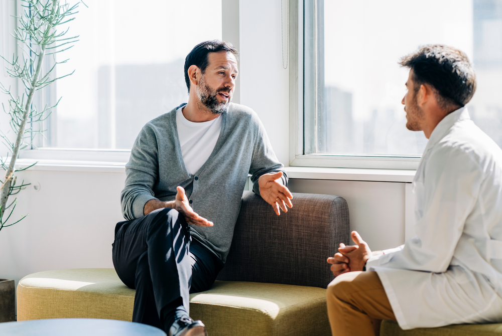Health professional talking to patient