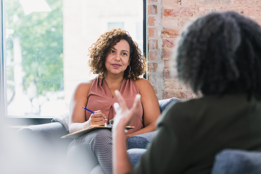 Health professional talking to patient
