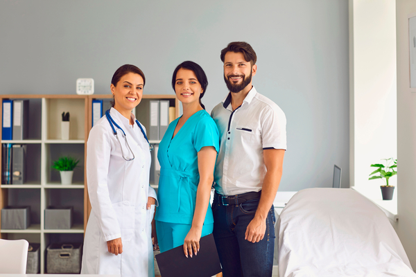 Three medical professionals standing together