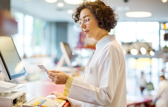 Pharmacist checking order