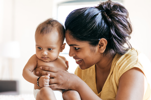 Woman holding her baby