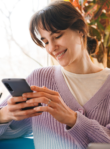 Woman with mobile phone in hand