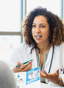 Health professional talking to patient