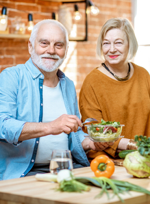 Older couple preparing meal