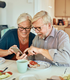 Senior couple using a phone