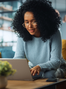 Person looking at information on her laptop