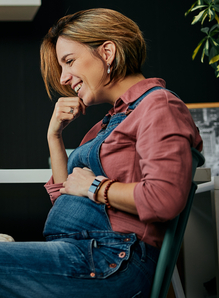 pregnant woman sitting in chair