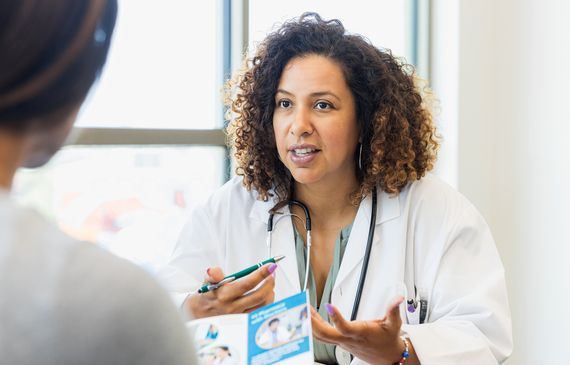 Health professional talking to patient