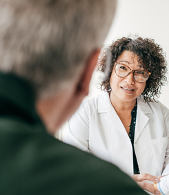 Man talking to health professional