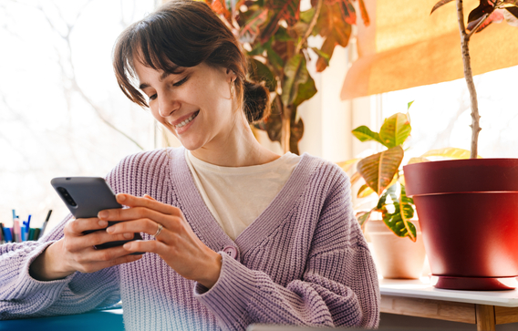 Person looking at information on a mobile phone